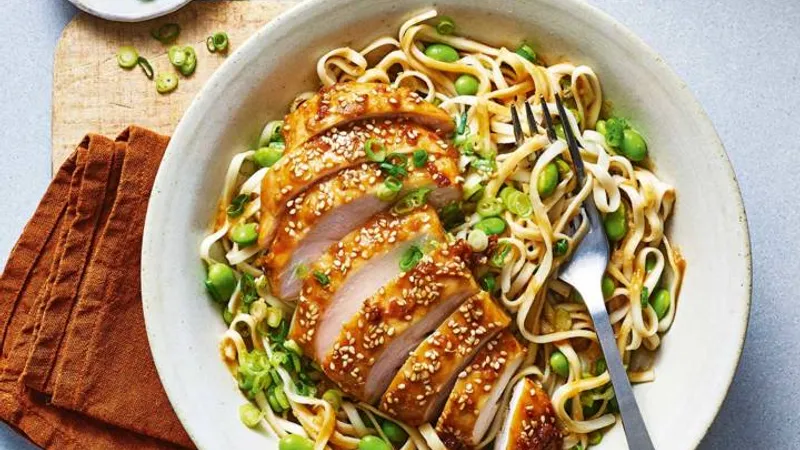 Tahini-soy chicken with edamame noodles